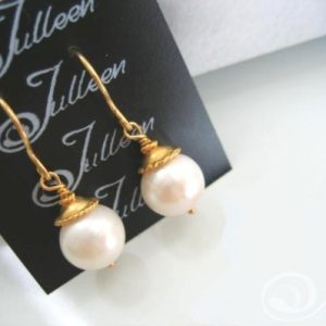 Alice Earrings. Single drop pearl earring with a touch of gold