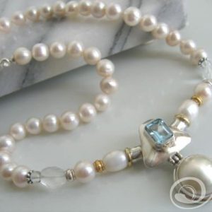 Blue Topaz Shield Necklace. Emerald Cut SB Topaz and White Mabe Pearl Necklace