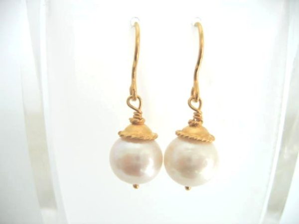 Alice Earrings. Single drop pearl earring with a touch of gold - Image 2