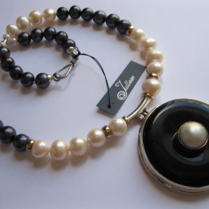 Boogie White Mabe Onyx Donut Pendant on Black and White Pearls.
